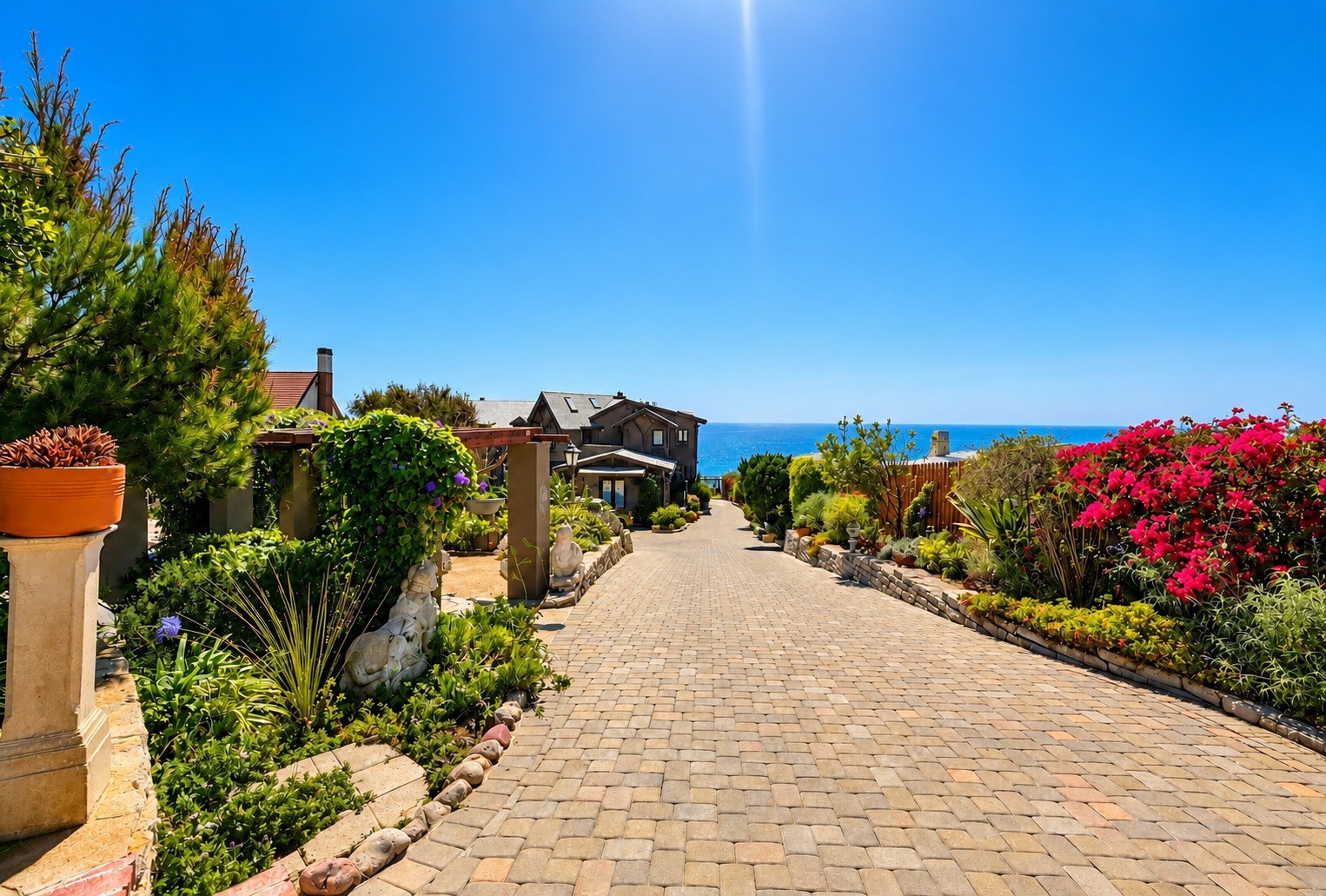 Landscaped driveway toward the ocean
